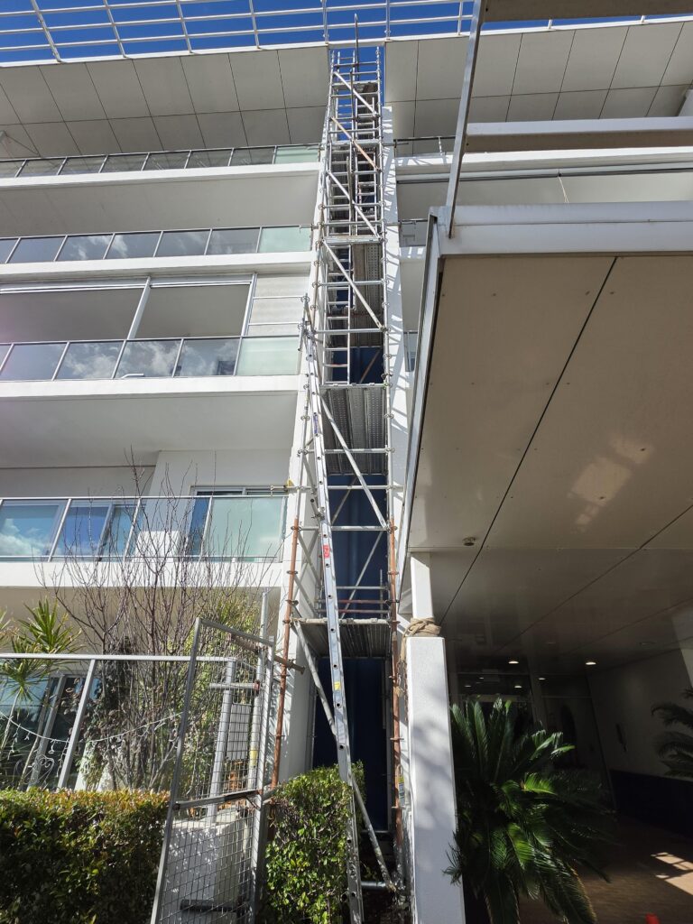 Scaffold access set up on a multi-storey building, Como